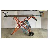 Folding and adjustable work stand with power cord and plug Folding and adjustable work stand with power cord and plug