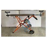 Folding and adjustable work stand with power cord and plug Folding and adjustable work stand with power cord and plug
