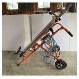 Folding and adjustable work stand with power cord and plug Folding and adjustable work stand with power cord and plug