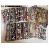 Large Box of Unsorted Binder Sheets - Baseball and Football Cards