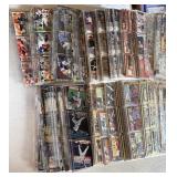 Large Box of Unsorted Binder Sheets - Baseball and Football Cards