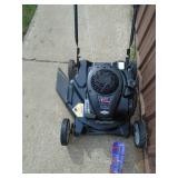 Murray push mower with Briggs & Stratton motor. Lightly used. Tested & works. As shown.