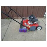 Yard Machine 21 push mower. Good condition. Tested & works. As shown.