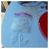 Christmas Decorations and Accessories - a Santa-themed tin, a decorative wood sign with a Nativity scene, and a "Faith Family Farming" snowman decoration