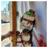 Christmas Decorations and Accessories - a Santa-themed tin, a decorative wood sign with a Nativity scene, and a "Faith Family Farming" snowman decoration