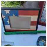 Decorative Home Items including Framed Art, Metal Jug, and Wooden Words