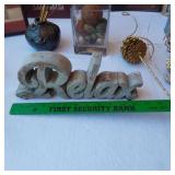 Decorative Home Items including Framed Art, Metal Jug, and Wooden Words