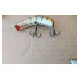 Vintage fishing lures including Kautzky Lazy Ike, Rapala Minnow, and others