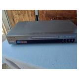 Samsung DVD/CD/MP3 Player DVD-S221 and Magnavox DVD/VCR Player with Texas Instruments Calculator