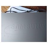 Samsung DVD/CD/MP3 Player DVD-S221 and Magnavox DVD/VCR Player with Texas Instruments Calculator