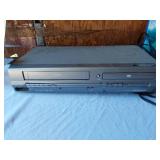 Samsung DVD/CD/MP3 Player DVD-S221 and Magnavox DVD/VCR Player with Texas Instruments Calculator