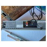 Samsung DVD/CD/MP3 Player DVD-S221 and Magnavox DVD/VCR Player with Texas Instruments Calculator