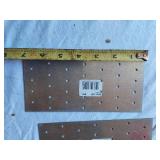 Assorted Hardware and Electrical Components including Plates, Hinges, Chains, and Accessories