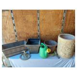 Assorted Planters and Garden Tools including Decorative Clay Pot, Watering Can, and Hose Nozzle