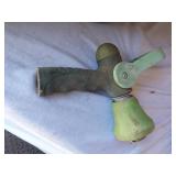 Assorted Planters and Garden Tools including Decorative Clay Pot, Watering Can, and Hose Nozzle