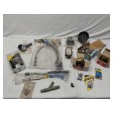 Automotive Parts Assortment including Trico Washer Pump, Weasler Cross & Bearing Kit, and Nippon Speedometer