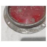 Assorted Automotive Parts including Broken Pontiac Emblem, Guide R8-50 Light, and Various Lenses