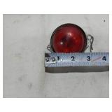 Assorted Automotive Parts including Broken Pontiac Emblem, Guide R8-50 Light, and Various Lenses