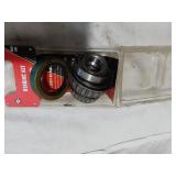 Bearing kit including Part 502, various metal plates, and hardware components