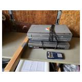 Samsung DVD/CD/MP3 Player DVD-S221 and Magnavox DVD/VCR Player with Texas Instruments Calculator