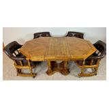 Mid Century Octagonal Dining Table with Leaf and Four Vinyl Barrel Chairs on Wheels Mid Century Octagonal Dining Table with Leaf and Four Vinyl Barrel Chairs on Wheels