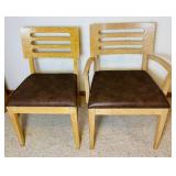 Two Wooden Dining Chairs with Vinyl Upholstered Cushions Two Wooden Dining Chairs with Vinyl Upholstered Cushions