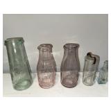 Antique Glass Bottle Collection with Embossed Logos Antique Glass Bottle Collection with Embossed Logos