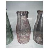 Antique Glass Bottle Collection with Embossed Logos Antique Glass Bottle Collection with Embossed Logos