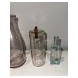 Antique Glass Bottle Collection with Embossed Logos Antique Glass Bottle Collection with Embossed Logos