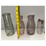 Antique Glass Bottle Collection with Embossed Logos Antique Glass Bottle Collection with Embossed Logos