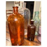 Vintage Glass Bottle Collection - Amber, Clear, and More Vintage Glass Bottle Collection - Amber, Clear, and More