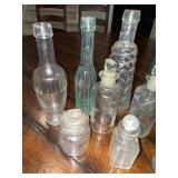 Vintage Collection of 14 French and English Assorted Glass Bottles with Stoppers Vintage Collection of 14 French and English Assorted Glass Bottles with Stoppers