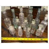 Vintage Collection of 14 French and English Assorted Glass Bottles with Stoppers Vintage Collection of 14 French and English Assorted Glass Bottles with Stoppers