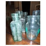 Lot of Antique English Embossed Apothecary Glass Bottles Lot of Antique English Embossed Apothecary Glass Bottles
