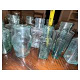 Lot of Antique English Embossed Apothecary Glass Bottles Lot of Antique English Embossed Apothecary Glass Bottles