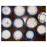 Antique French Flow Blue Butter Pat Plates Set of 11 with Gold Detailing Antique French Flow Blue Butter Pat Plates Set of 11 with Gold Detailing