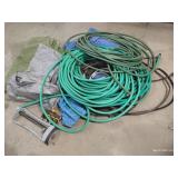 Large Pile of Tarps & Hoses Large Pile of Tarps & Hoses