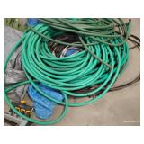 Large Pile of Tarps & Hoses Large Pile of Tarps & Hoses