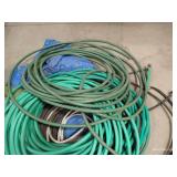 Large Pile of Tarps & Hoses Large Pile of Tarps & Hoses