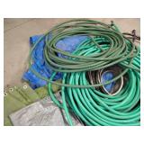 Large Pile of Tarps & Hoses Large Pile of Tarps & Hoses