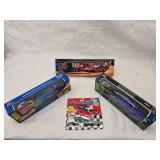 (3) 1/64 Scale Nascar Transporters and (1) Mini Transporter