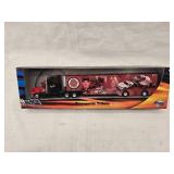 (3) 1/64 Scale Nascar Transporters and (1) Mini Transporter