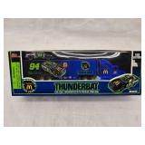 (3) 1/64 Scale Nascar Transporters and (1) Mini Transporter