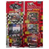 (15) 1/64 Scale Nascar Collectables Cars with Trading Card and Display Stand