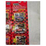 (15) 1/64 Scale Nascar Collectables Cars with Trading Card and Display Stand