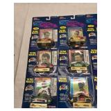 (18) 1/64 Scale Nascar Collectables Cars with Trading Card and Display Stand