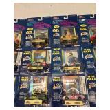 (18) 1/64 Scale Nascar Collectables Cars with Trading Card and Display Stand
