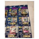 (18) 1/64 Scale Nascar Collectables Cars with Trading Card and Display Stand
