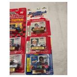 (15) Nascar Super Turck Collectables with Trading cars and stand