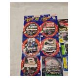 (18) 1/64 Scale Nascar Collectables with Display Stand and Trading Cards